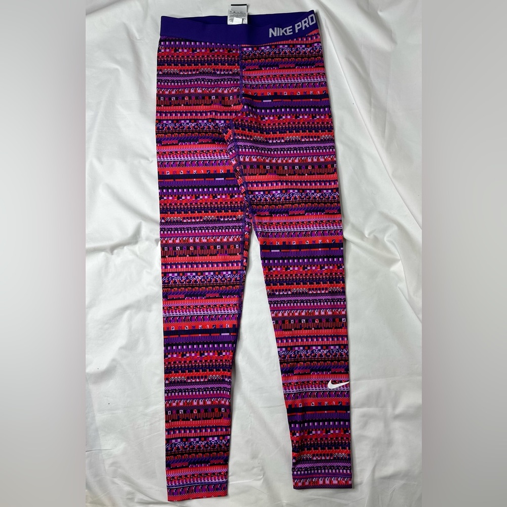 Women’s Nike multi color print leggings sz medium